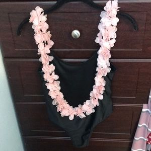 Black one piece swimsuit with pink floral detail